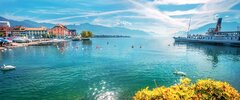 Picturesque landscape with touristic old ferry on Geneva Lake in Vevey town. Vaud canton, Switzerland