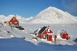 Verschneite Häuser auf Grönland